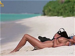 luxurious Bo Derek flashing off her furry coochie at the beach